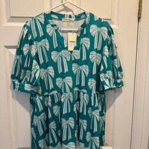 Teal Dress with White Bow Pattern
